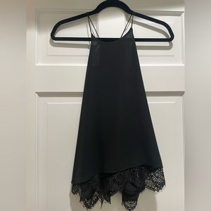 Black tank top with lace along the bottom